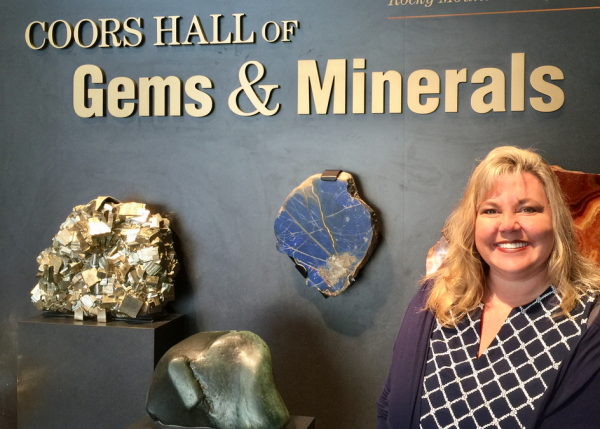 Elizabeth Van Tassel, gemologist and resilience expert, visits the Gems and Minerals exhibit in Denver.