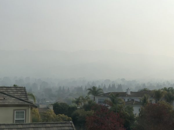 Smoky hills and setting from the Camp Fire in the Bay Area with resilience expert author Elizabeth Van Tassel.